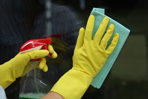 Professional gutter cleaning on a Highbury terrace home