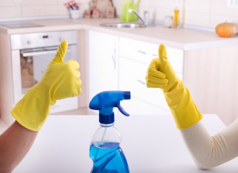 Local cleaners working in a Highbury shopfront or retail space