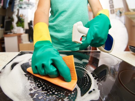 Professional cleaners working in a Highbury flat or apartment